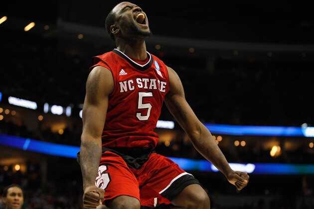 PITTSBURGH, PA - MARCH 21:  Desmond Lee #5 of the North Carolina State Wolfpack celebrates after the Wolfpack defeated the Villanova Wildcats 71-68 during the third round of the 2015 NCAA Men's Basketball Tournament at Consol Energy Center on March 21, 2015 in Pittsburgh, Pennsylvania.  (Photo by Justin K. Aller/Getty Images)