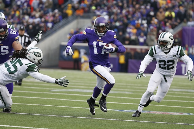 Minnesota Vikings wide receiver Jarius Wright (17) runs from New York Jets defenders Calvin Pryor (25) and Marcus Williams (22) during the second half of an NFL football game, Sunday, Dec. 7, 2014, in Minneapolis. (AP Photo/Alex Brandon)