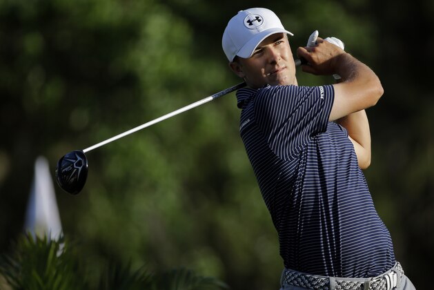 Jordan Spieth tees off on the second playoff hole during the Valspar Championship golf tournament Sunday, March 15, 2015, at Innisbrook in Palm Harbor, Fla. Spieth won the tournament on the third playoff hole. (AP Photo/Chris O'Meara)