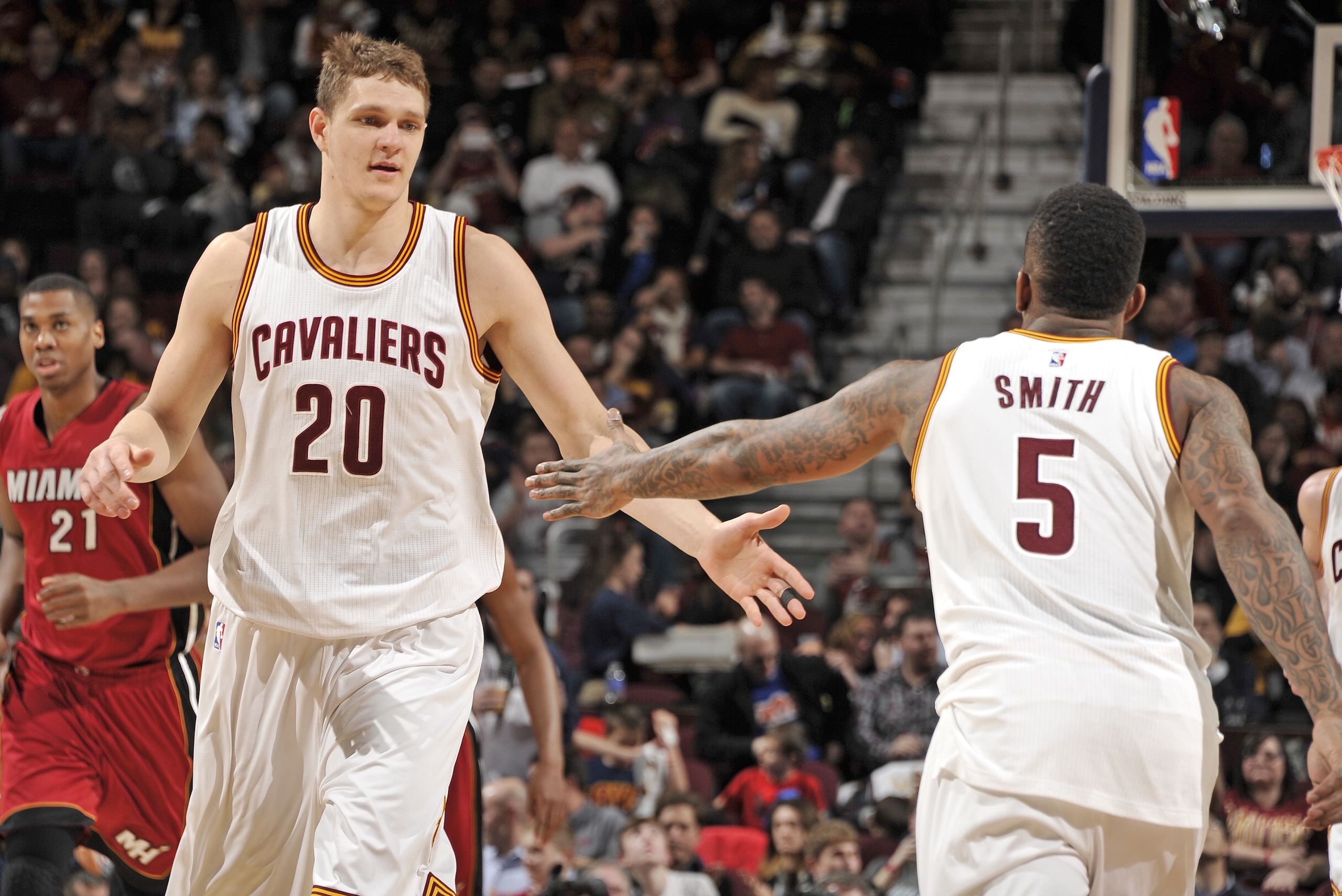 CLEVELAND, OH - FEBRUARY 11:  Timofey Mozgov #20 and J.R. Smith #5 of the Cleveland Cavaliers during the game against the Miami Heat on February 11, 2015 at Quicken Loans Arena in Cleveland, Ohio. NOTE TO USER: User expressly acknowledges and agrees that, by downloading and/or using this Photograph, user is consenting to the terms and conditions of the Getty Images License Agreement. Mandatory Copyright Notice: Copyright 2015 NBAE (Photo by David Liam Kyle/NBAE via Getty Images)