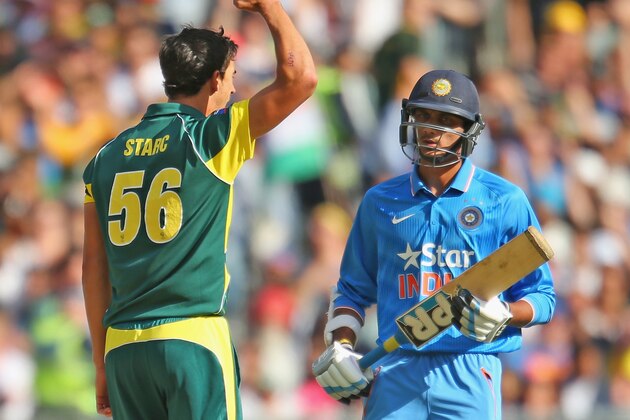 MELBOURNE, AUSTRALIA - JANUARY 18:  Mitchell Starc of Australia celebrates after dismissing Akshar Patel of India during the One Day International match between Australia and India at the Melbourne Cricket Ground on January 18, 2015 in Melbourne, Australia.  (Photo by Scott Barbour/Getty Images)