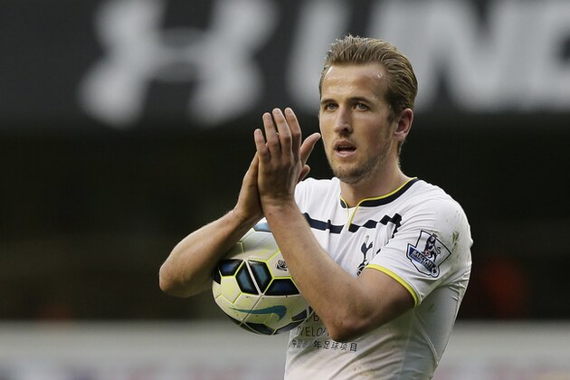 Tottenham Hotspur’s Harry Kane applauds the crowd after his team won the English Premier League soccer match between Tottenham and Leicester City at White Hart Lane, London, Saturday, March 21, 2015. (AP Photo/Tim Ireland)