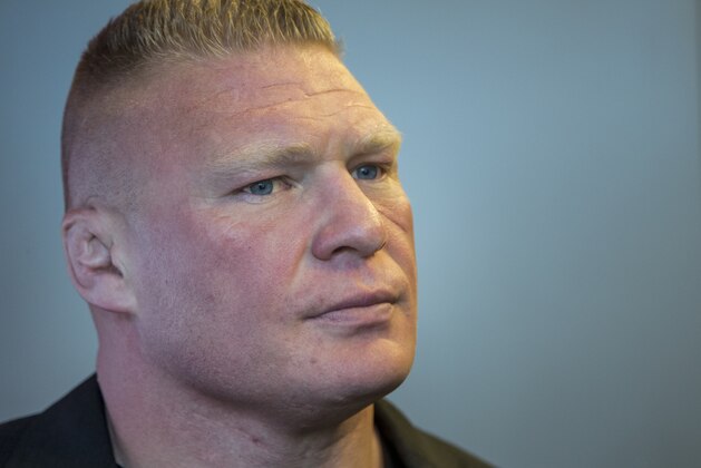 Former UFC heavyweight champion Brock Lesnar pauses for a photo after ruling out a return to mixed martial arts, ending three years of speculation about the biggest pay-per-view star in the sport's history, as he announced he had re-signed with WWE in an interview on ESPN's