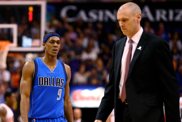 Mar 22, 2015; Phoenix, AZ, USA; Dallas Mavericks guard Rajon Rondo (9) and head coach Rick Carlisle against the Phoenix Suns at US Airways Center. The Suns defeated the Mavericks 98-92. Mandatory Credit: Mark J. Rebilas-USA TODAY Sports
