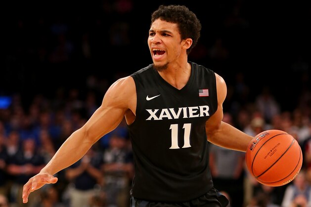 NEW YORK, NY - MARCH 12:  Dee Davis #11 of the Xavier Musketeers calls out the play in the first half against the Butler Bulldogs during a quarterfinal game of the Big East basketball tournament at Madison Square Garden on March 12, 2015 in New York City.  (Photo by Elsa/Getty Images)