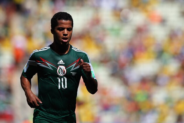 FORTALEZA, BRAZIL - JUNE 29:  Giovani Dos Santos of Mexico looks on during the 2014 FIFA World Cup Brazil Round of 16 match between Netherlands and Mexico at Castelao on June 29, 2014 in Fortaleza, Brazil.  (Photo by Dean Mouhtaropoulos/Getty Images)