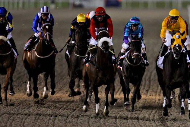 Kinsale King from U.S. ridden by Garrett Gomez, right, wins the Dubai Golden Shaheen of Dubai World Cup at Meydan horse race track in Dubai, United Arab Emirates, Saturday March 27, 2010. (AP Photo/Kamran Jebreili)