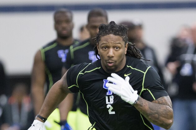 Bud Dupree runs through drills during NFL football Pro Day at the University of Kentucky in Lexington, Ky., Thursday, March 12, 2015. (AP Photo/David Stephenson)