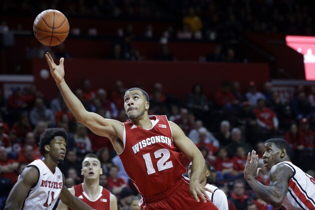 Wisconsin guard Traevon Jackson (12) shoots during the first half of an NCAA college basketball game against Rutgers, Sunday, Jan. 11, 2015, in Piscataway, N.J. (AP Photo/Mel Evans)