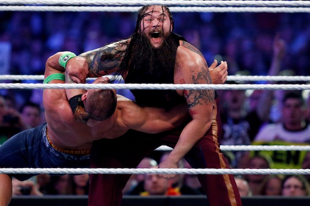 John Cena, left, and Bray Wyatt, right, compete during Wrestlemania XXX at the Mercedes-Benz Super Dome in New Orleans on Sunday, April 6, 2014. (Jonathan Bachman/AP Images for WWE)