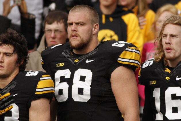 IOWA CITY, IA - OCTOBER 26:  Offensive lineman Brandon Scherff #68 of the Iowa Hawkeyes stands for the national anthem before the match-up against the Northwestern Wildcats on October 26, 2013 at Kinnick Stadium in Iowa City, Iowa. Iowa won 17-10.  (Photo by Matthew Holst/Getty Images)