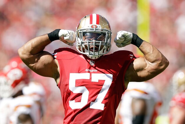 SANTA CLARA, CA - OCTOBER 05:  Michael Wilhoite #57 of the San Francisco 49ers flexes his muscles after making a tackled during their game against the Kansas City Chiefs at Levi's Stadium on October 5, 2014 in Santa Clara, California.  (Photo by Ezra Shaw/Getty Images)