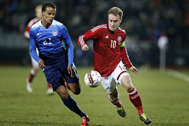 Timothy Chandler from the US, left, and Christian Eriksen from Denmark in action during a friendly soccer match at NRGI Stadium in Aarhus, Denmark, Wednesday March 25, 2015. (AP Photo/POLFOTO, Jens Dresling)  DENMARK OUT