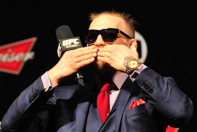 Oct 24, 2014; Rio de Janeiro, BRAZIL; Conor McGregor interacts with fans during a Q&A session before weigh-ins for UFC 179 at Ginasio do Maracanazinho. Mandatory Credit: Jason Silva-USA TODAY Sports