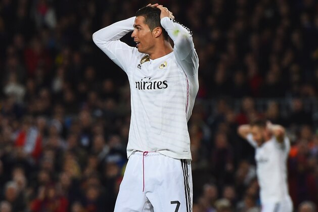 BARCELONA, SPAIN - MARCH 22:  Cristiano Ronaldo of Real Madrid CF (7) reacts during the La Liga match between FC Barcelona and Real Madrid CF at Camp Nou on March 22, 2015 in Barcelona, Spain.  (Photo by David Ramos/Getty Images)