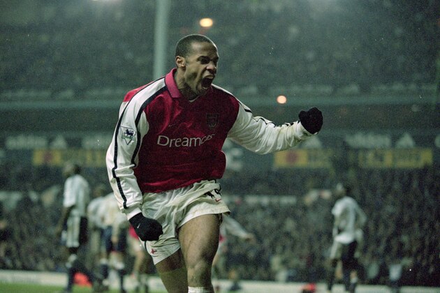 18 Dec 2000:  Thierry Henry of Arsenal celebrates during the FA Carling Premiership match against Tottenham Hotspur at White Hart Lane in London.  The match was drawn 1-1. \ Mandatory Credit: Jamie McDonald /Allsport