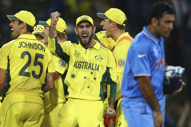 SYDNEY, AUSTRALIA - MARCH 26:  Glenn Maxwell of Australia celebrates after Mitchell Starc of Australia  took the wicket of Ajinkya Rahane of India during the 2015 Cricket World Cup Semi Final match between Australia and India at Sydney Cricket Ground on March 26, 2015 in Sydney, Australia.  (Photo by Ryan Pierse/Getty Images)