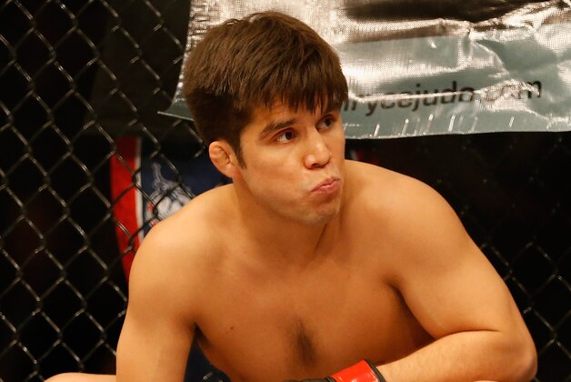 PHOENIX, AZ - DECEMBER 13:  Henry Cejudo is introduced during the UFC Fight Night event against Dustin Kimura (not pictured) at the at U.S. Airways Center on December 13, 2014 in Phoenix, Arizona.  (Photo by Christian Petersen/Getty Images)