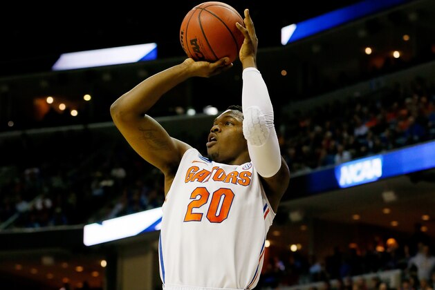 MEMPHIS, TN - MARCH 27:  Michael Frazier II #20 of the Florida Gators takes a shot against the UCLA Bruins during a regional semifinal of the 2014 NCAA Men's Basketball Tournament at the FedExForum on March 27, 2014 in Memphis, Tennessee.  (Photo by Kevin C. Cox/Getty Images)