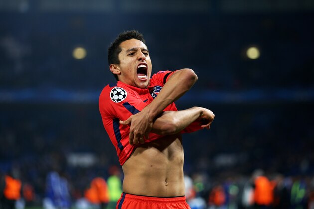 LONDON, ENGLAND - MARCH 11:  Marquinhos of PSG celebrates as his team go through on away goals following extra time during the UEFA Champions League Round of 16, second leg match between Chelsea and Paris Saint-Germain at Stamford Bridge on March 11, 2015 in London, England.  (Photo by Paul Gilham/Getty Images)