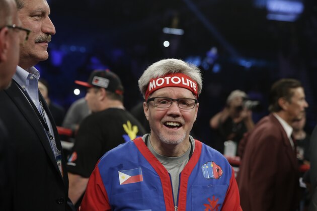 Trainer Freddie Roach stands in the ring after the WBO welterweight title boxing fight between Manny Pacquiao and Timothy Bradley Saturday, April 12, 2014, in Las Vegas. (AP Photo/Isaac Brekken)