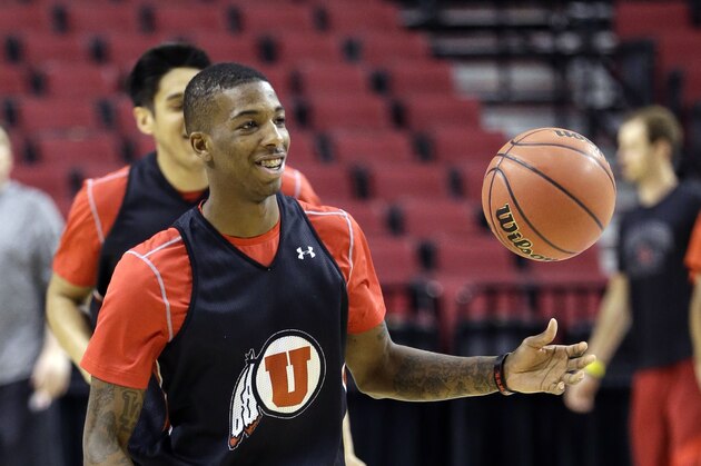 Utah guard Delon Wright flips the ball as he runs downcourt during practice for an NCAA college basketball second-round game in Portland, Ore., Wednesday, March 18, 2015. Utah is to play Stephen F. Austin on Thursday. (AP Photo/Don Ryan)