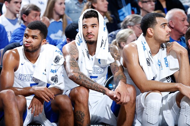 LOUISVILLE, KY - MARCH 21:  (L-R)Teammates Andrew Harrison #5, Willie Cauley-Stein #15 and Trey Lyles #41 of the Kentucky Wildcats sit on the bench against the Cincinnati Bearcats during the third round of the 2015 NCAA Men's Basketball Tournament at KFC YUM! Center on March 21, 2015 in Louisville, Kentucky.  (Photo by Joe Robbins/Getty Images)