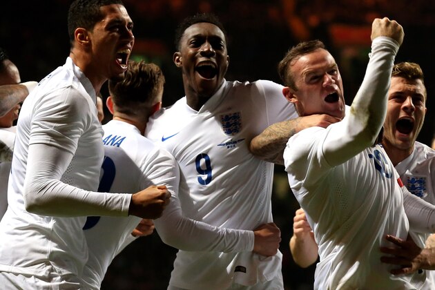GLASGOW, SCOTLAND - NOVEMBER 18:  Wayne Rooney of England celebrates after scoring his team's second goal during the International Friendly match between Scotland and England at Celtic Park Stadium on November 18, 2014 in Glasgow, Scotland.  (Photo by Alex Livesey/Getty Images)
