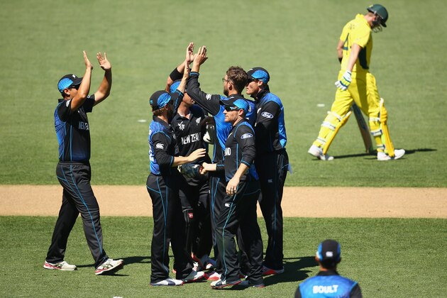 AUCKLAND, NEW ZEALAND - FEBRUARY 28: Daniel Vettori celebrates with his team mates after taking the wicket of Steve Smith of Australia during the 2015 ICC Cricket World Cup match between Australia and New Zealand at Eden Park on February 28, 2015 in Auckland, New Zealand.  (Photo by Mark Kolbe/Getty Images)
