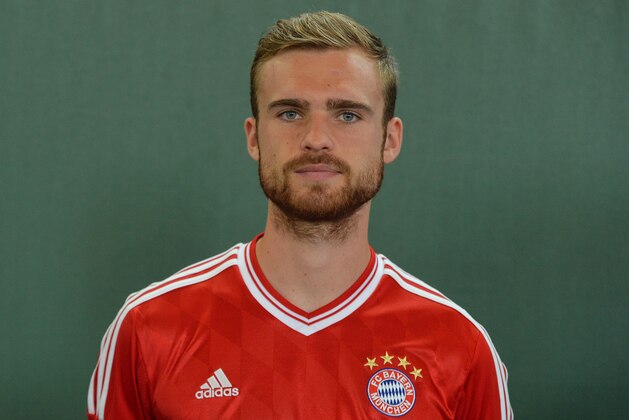 Jan Kirchhoff  poses during the official photo opportunity of the German first division Bundesliga soccer team FC Bayern Munich in Munich, southern Germany, on Thursday, July 18, 2013 (AP Photo/Kerstin Joensson)