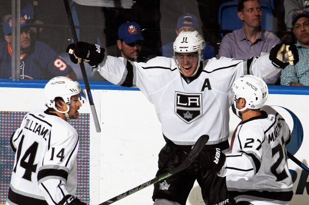 UNIONDALE, NY - MARCH 26: Anze Kopitar #11 of the Los Angeles Kings celebrates his game winning goal at 15:37 of the third period against the New York Islanders at the Nassau Veterans Memorial Coliseum on March 26, 2015 in Uniondale, New York. The Kings defeated the Islanders 3-2. (Photo by Bruce Bennett/Getty Images)