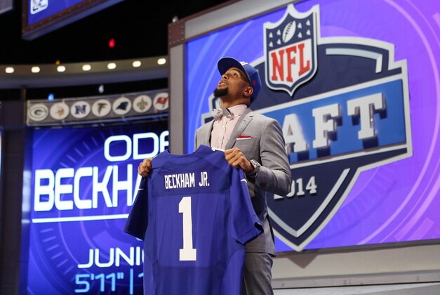 May 8, 2014; New York, NY, USA; Odell Beckham Jr. (LSU) looks up from the stage after being selected as the number twelve overall pick in the first round of the 2014 NFL Draft to the New York Giants at Radio City Music Hall. Mandatory Credit: Adam Hunger-USA TODAY Sports