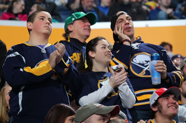 BUFFALO, NY - MARCH 26: Fans of the Buffalo Sabres cheer for a Sabres goal against the Arizona Coyotes on March 26, 2015 at the First Niagara Center in Buffalo, New York. Arizona won, 4-3 in overtime. (Photo by Bill Wippert/NHLI via Getty Images)