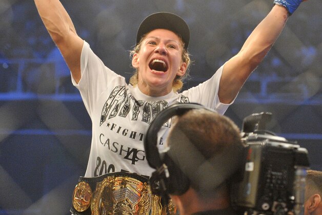 SAN JOSE, CA - AUGUST 15:  Cris Cyborg celebrates after defeating Gina Carano during their Middleweight  Championship Title fight at Stikeforce: Carano vs. Cyborg on August 15, 2009 in San Jose, California.  (Photo by Jon Kopaloff/Getty Images)