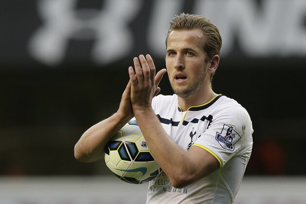 Tottenham Hotspur’s Harry Kane applauds the crowd after his team won the English Premier League soccer match between Tottenham and Leicester City at White Hart Lane, London, Saturday, March 21, 2015. (AP Photo/Tim Ireland)
