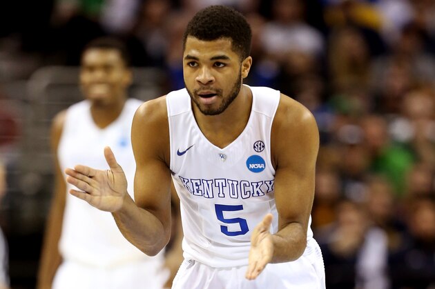 CLEVELAND, OH - MARCH 26: Andrew Harrison #5 of the Kentucky Wildcats reacts after a play in the first half against the West Virginia Mountaineers during the Midwest Regional semifinal of the 2015 NCAA Men's Basketball Tournament at Quicken Loans Arena on March 26, 2015 in Cleveland, Ohio.  (Photo by Andy Lyons/Getty Images)