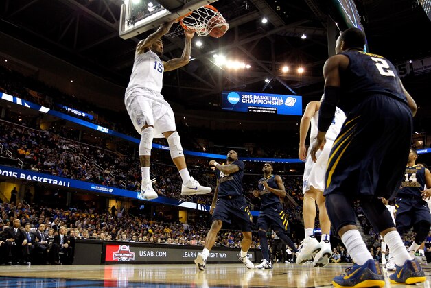 CLEVELAND, OH - MARCH 26:  Willie Cauley-Stein #15 of the Kentucky Wildcats goes up for a dunk in the second half against the West Virginia Mountaineers during the Midwest Regional semifinal of the 2015 NCAA Men's Basketball Tournament at Quicken Loans Arena on March 26, 2015 in Cleveland, Ohio.  (Photo by Gregory Shamus/Getty Images)