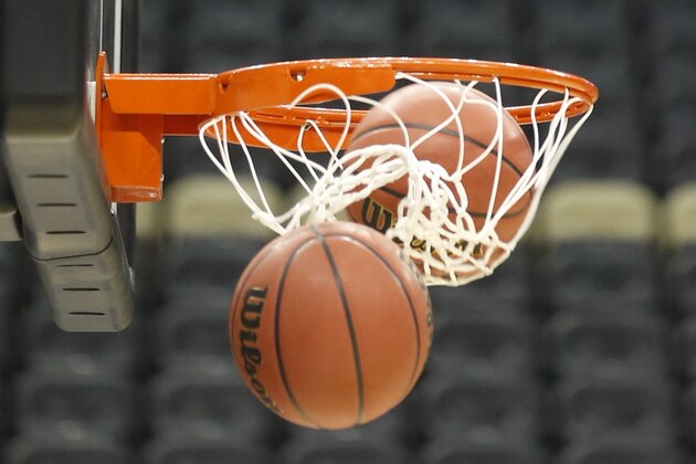 Basketballs head through the hoops in the practice session for Lafayette  for an NCAA college basketball second round game in Pittsburgh Wednesday, March 18, 2015. (AP Photo/Keith Srakocic)