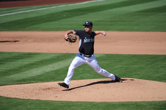 PEORIA, AZ - MARCH 4:  David Rollins #73 of the Seattle Mariners pitches during the game against the San Diego Padres on March 4, 2015 at Peoria Stadium in Peoria, Arizona.  The Mariners defeated the Padres 4-3 in 10 innings. (Photo by Rich Pilling/Getty Images)