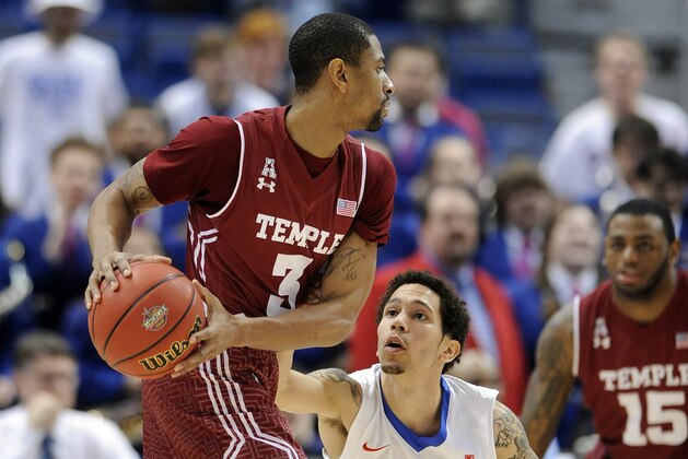 Temple’s Jesse Morgan, left, is guarded by SMU’s Nic Moore during the first half of an NCAA college basketball game in the semifinals of the American Athletic Conference tournament in Hartford, Conn., on Saturday, March 14, 2015. (AP Photo/Fred Beckham)