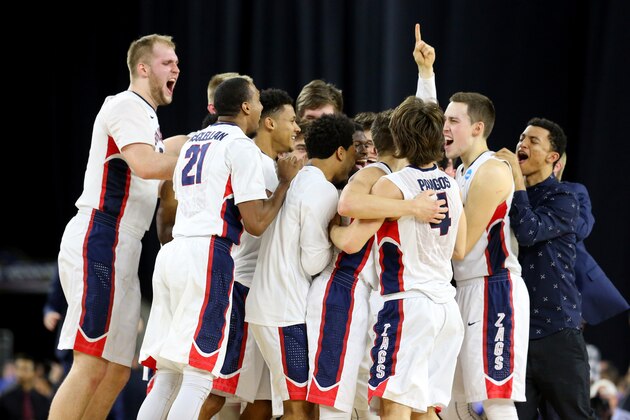 HOUSTON, TX - MARCH 27: The Gonzaga Bulldogs celebrate after defeating the UCLA Bruins 74-62 during a South Regional Semifinal game of the 2015 NCAA Men's Basketball Tournament at NRG Stadium on March 27, 2015 in Houston, Texas.  (Photo by Ronald Martinez/Getty Images)