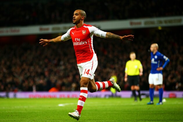 LONDON, ENGLAND - FEBRUARY 10:  Theo Walcott of Arsenal celebrates after scoring his team's second goal during the Barclays Premier League match between Arsenal and Leicester City at Emirates Stadium on February 10, 2015 in London, England.  (Photo by Richard Heathcote/Getty Images)