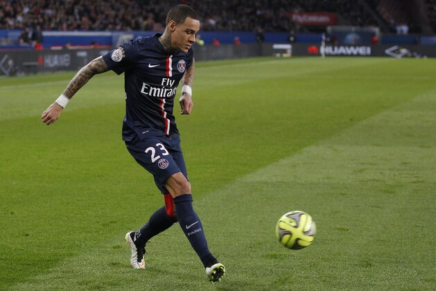 PSG's Dutch Gregory van der Wiel, controls the ball during a League One soccer match Paris Saint Germain against Lens at Parc des Prince stadium in Paris, France, Saturday, March 7, 2015. (AP Photo/Michel Euler)