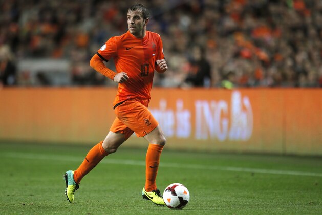 Netherlands' Rafael van der Vaart plays the ball during the Group D World Cup qualifying soccer match between Netherlands and Hungary, at ArenA stadium in Amsterdam, Netherlands, Friday Oct. 11, 2013. (AP Photo/Peter Dejong)