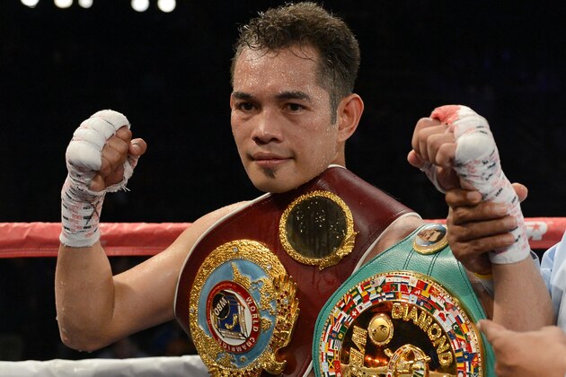 CARSON, CA - OCTOBER 13:  Nonito Donaire of The Phillipines poses with the belt after his ninth round TKO of Toshioka Nishioka of Japan during the WBO Super Bantamweight Title fight at The Home Depot Center on October 13, 2012 in Carson, California.  (Photo by Harry How/Getty Images)