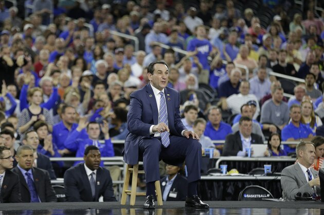 Duke head coach Mike Krzyzewski reacts to play against Utah during the second half of a college basketball regional semifinal game in the NCAA Tournament Friday, March 27, 2015, in Houston. (AP Photo/Charlie Riedel)
