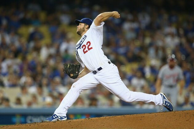 LOS ANGELES, CA - SEPTEMBER 02:  Clayton Kershaw #22 of the Los Angeles Dodgers pitches against the Washington Nationals at Dodger Stadium on September 2, 2014 in Los Angeles, California.  (Photo by Jeff Gross/Getty Images)
