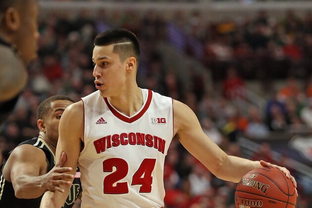CHICAGO, IL - MARCH 14:  Bronson Koenig #24 of the Wisconsin Badgers moves against P.J. Thompson #3 of the Purdue Boilermakers during the semifinal round of the 2015 Big Ten Men's Basketball Tournament at the United Center on March 14, 2015 in Chicago, Illinois. Wisconsin defeated Purdue 71-51.  (Photo by Jonathan Daniel/Getty Images)