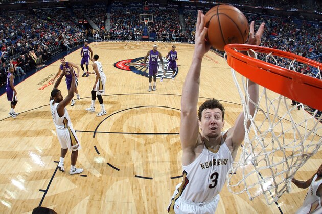 NEW ORLEANS, LA - NOVEMBER 25:  Omer Asik #3 of the New Orleans Pelicans goes to the basket against the Sacramento Kings on November 25, 2014 at the Smoothie King Center in New Orleans, Louisiana. NOTE TO USER: User expressly acknowledges and agrees that, by downloading and or using this Photograph, user is consenting to the terms and conditions of the Getty Images License Agreement. Mandatory Copyright Notice: Copyright 2014 NBAE (Photo by Layne Murdoch Jr./NBAE via Getty Images)
