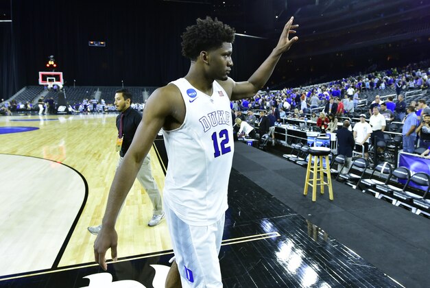 Mar 27, 2015; Houston, TX, USA; Duke Blue Devils forward Justise Winslow (12) waves to the crowd after defeating Utah Utes in the semifinals of the south regional of the 2015 NCAA Tournament at NRG Stadium. Mandatory Credit: Bob Donnan-USA TODAY Sports